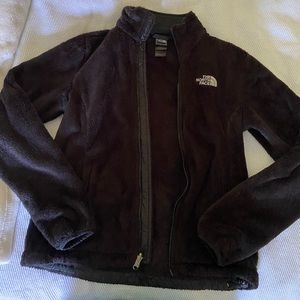 Black fuzzy North Face jacket